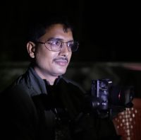 Behind the lens